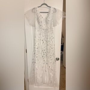 Chic White Gown with Leaf Accents